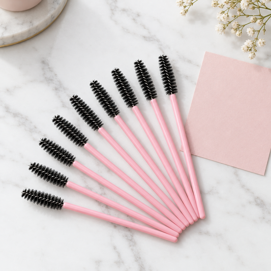 Ten pink lash spoolie wands
